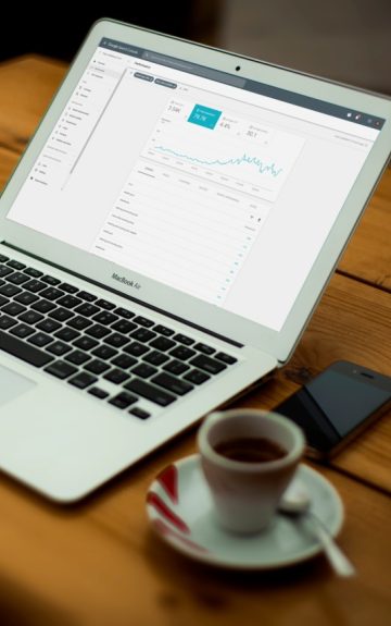 laptop with coffee and notepad
